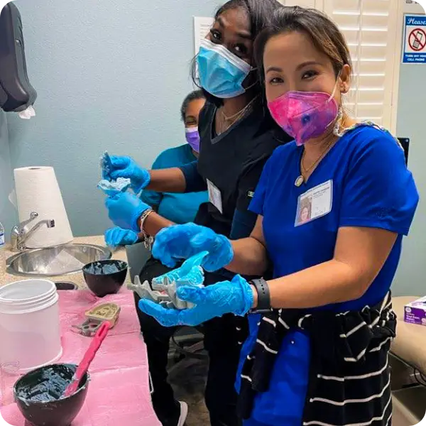 dental assistant students enjoy class